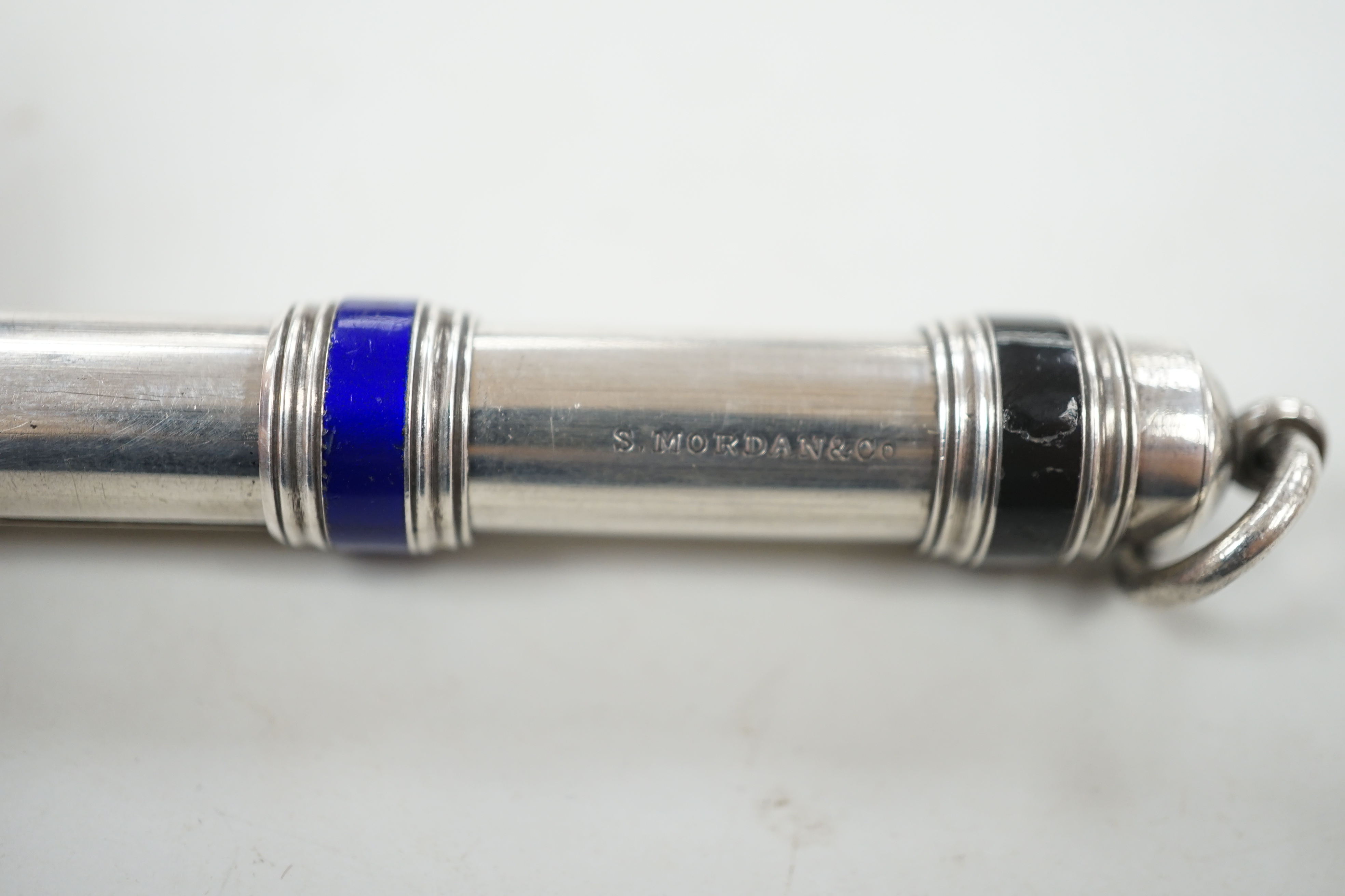 A late 19th/early 20th century Sampson Mordan & Co white metal overlaid three colour propelling pencil, 91mm.